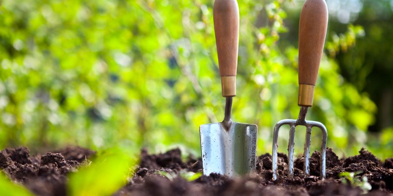 Gardening tools in soil