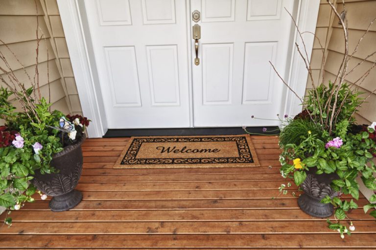 Welcome Home Entrance Double Doorway Flowers In Pots